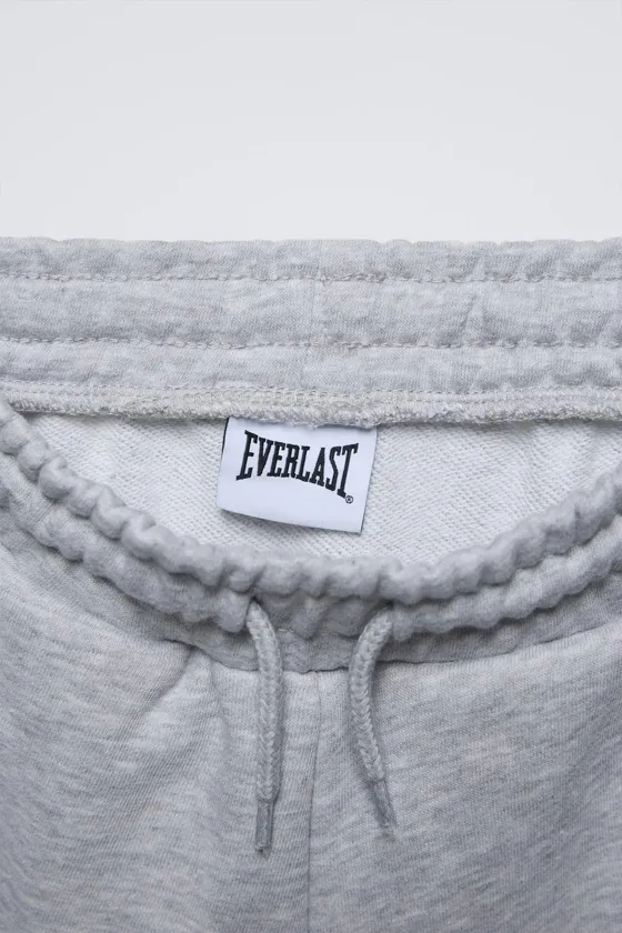 ШОРТЫ - БЕРМУДЫ С НАШИВКОЙ EVERLAST®